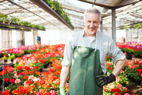 Photo: Greenhouse worker portrait Greenhouse worker portrait