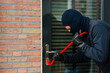 Thief with a crowbar
