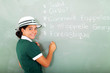 Photo: french schoolgirl writing on chalkboard french schoolgirl writing on chalkboard