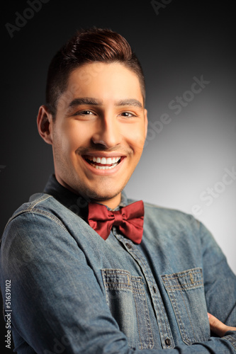 Photo: Young smiling male looking at camera Young smiling male looking at camera