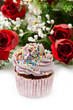Vanilla cupcakes, decorated with lavender-coloured butter cream