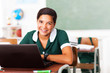 Photo: female middle school student using laptop female middle school student using laptop