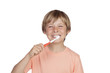 Smiling boy brushing his teeth