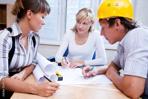 Photo: team of engineers working team of engineers working