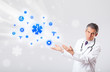 Doctor with blue medical icons