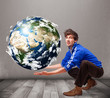 Good-looking man holding 3d planet earth