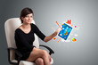 woman holding modern tablet with colorful diagrams and graphs