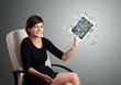 young woman holding tablet with money
