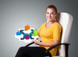 woman holding modern tablet with colorful shopping bags on cloud