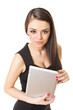 Gorgeous woman in black dress holding digital tablet