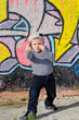 Adorable young boy pretending to box