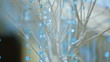 Blue pendants decorating a tree. Close-up