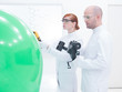 people scanning objects in lab