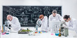 researchers under microscope analysis