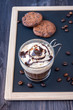 Coffee with whipped cream and chocolate chip cookies  