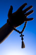 Foto: rosary in hand rosary in hand