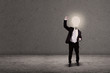 Successful businessman with lightbulb head