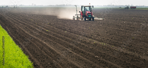 Photo: tractor and seeder tractor and seeder