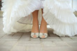 Photo: Bride Showing Her Shoes Bride Showing Her Shoes