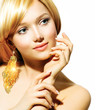 Beauty Blonde Fashion Model Girl With Golden Earrings