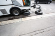 Photo: Detail of a street sweeper machine/car cleaning the road Detail of a street sweeper machine/car cleaning the road