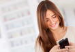 Woman sending text message