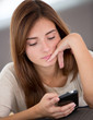 Woman texting on the phone