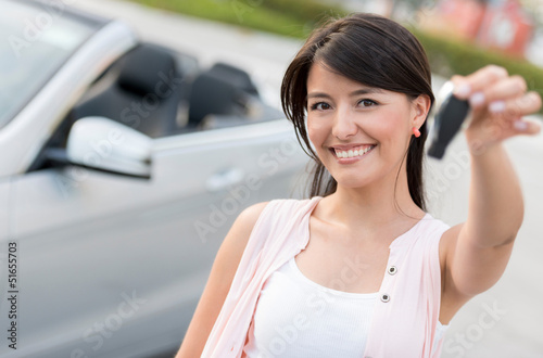 Photo: Woman renting a car Woman renting a car