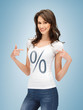 Photo: girl pointing at percent sign girl pointing at percent sign