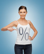 Foto: girl pointing at percent sign girl pointing at percent sign