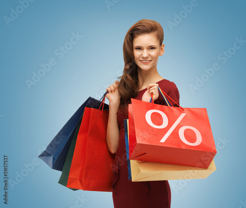 Photo: girl with shopping bags girl with shopping bags