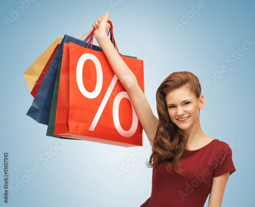 Photo: girl with shopping bags girl with shopping bags