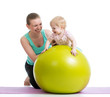 Mother Doing Gymnastics With B...