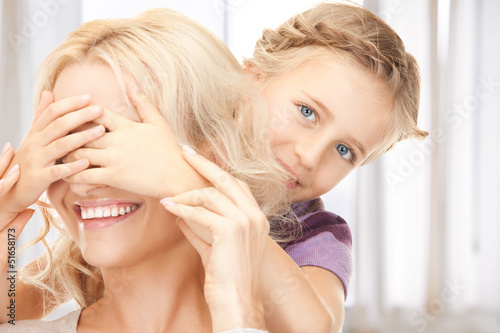 Photo: happy mother and little girl happy mother and little girl