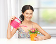 housewife with flower in pot and watering can