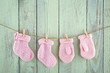 Socks and mittens on vintage clothesline