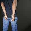 Murderer locked in handcuffs