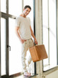 handsome man with retro suitcase