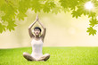 Asian girl doing yoga at green park