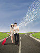 Couple search online for holiday destination