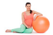 Beautiful pregnant woman with ball
