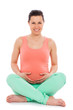 Beautiful pregnant woman sitting