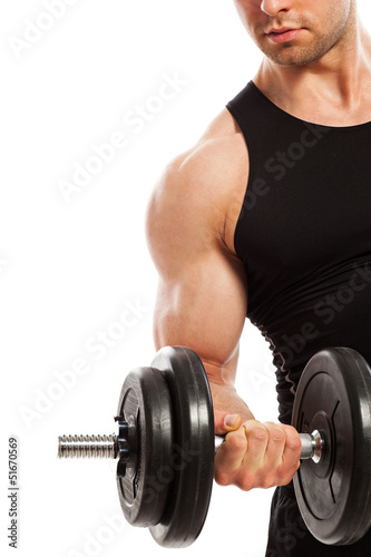 Photo: Handsome muscular guy working out Handsome muscular guy working out