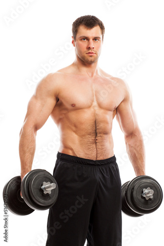 Photo: Handsome muscular guy working out Handsome muscular guy working out