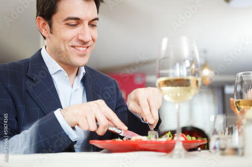Photo: Man having dinner Man having dinner