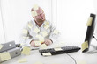 Office Worker with Notes Everywhere