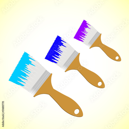 Vector: Three colour paint brushes on yellow smooth background Three colour paint brushes on yellow smooth background