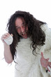 Photo: Threatening stoneage man holding a rock Threatening stoneage man holding a rock