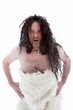 Snarling uncouth long haired caveman