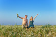 Photo: The happy young pair in the field of chamomiles The happy young pair in the field of chamomiles